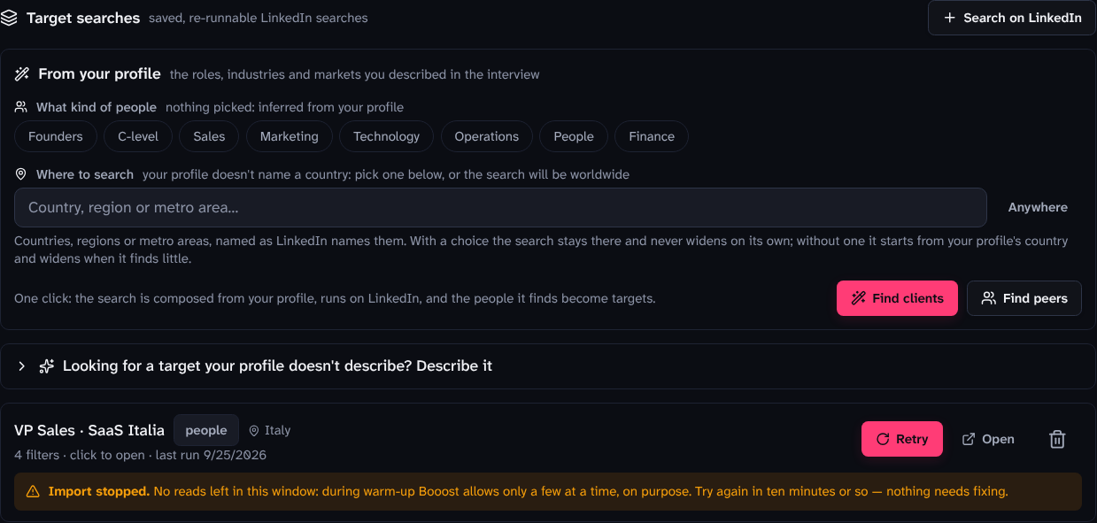 A saved search that stopped: the amber notice explains why and the button now reads "Retry"